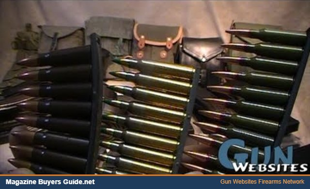 Steel AK magazines next to 7.62x39 ammunition
