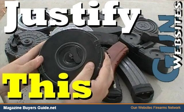 A drum magazine held next to standard box magazines