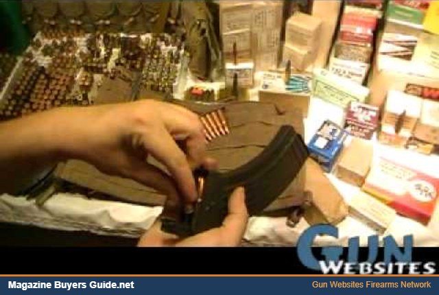 7.62x39 stripper clips and an AK magazine on a table